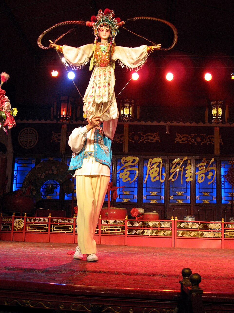 Open-air teahouse seating in Chengdu showing people gathered around tables in a classic slow social arrangement